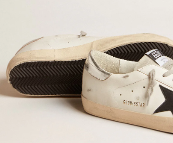 Super-Star en cuir blanc avec étoile en cuir nubuck noir et contrefort en cuir lamé argenté